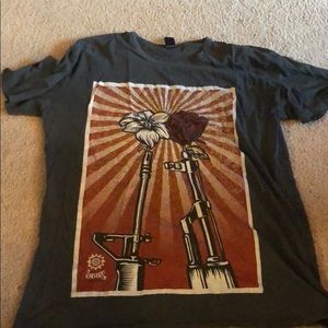 Obey T-shirt with guns and roses